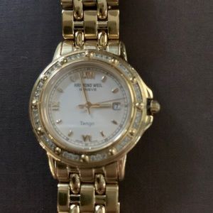 Raymond Weil Tango Diamond Gold  Watch
It is a show stopper!!